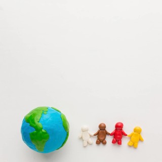 Top view plasticine globe people with copy space