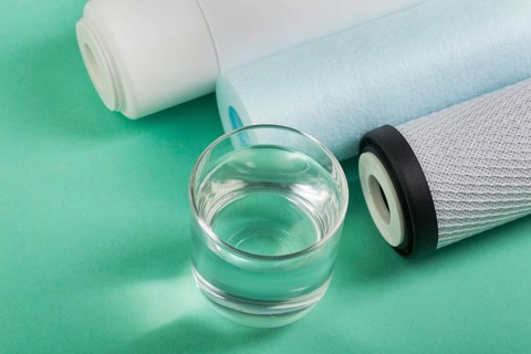 Water filters glass water high view