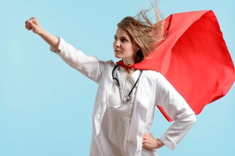Woman posing as super hero