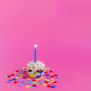 Candle burning cupcake