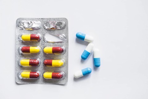 Capsules drug blister pack white background