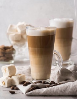 Close up tasty cappuccino with milk