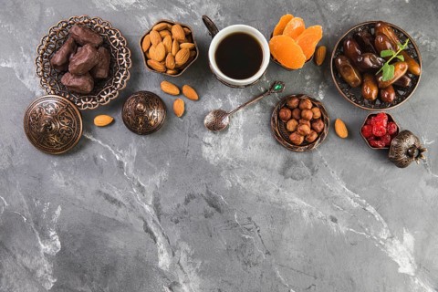 Coffee cup with dates fruit nuts