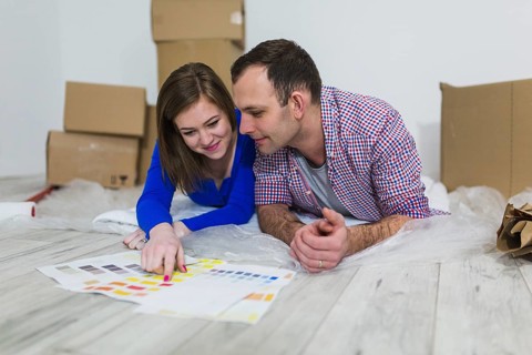 Couple choosing color interior decoration