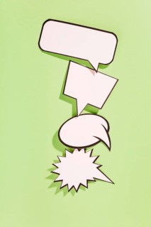 Different type white retro speech bubbles green background