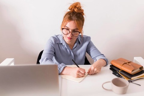 Front view female teacher home during online class