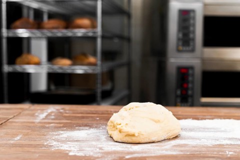 Kneaded dough with flour table bakery