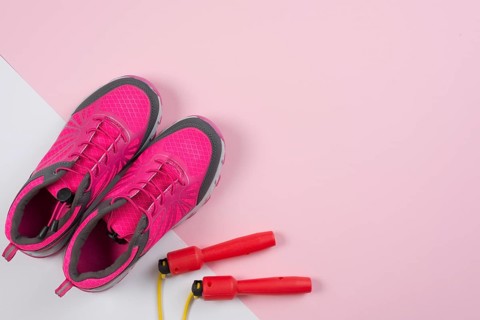 Lovely sport composition with skipping rope trainers