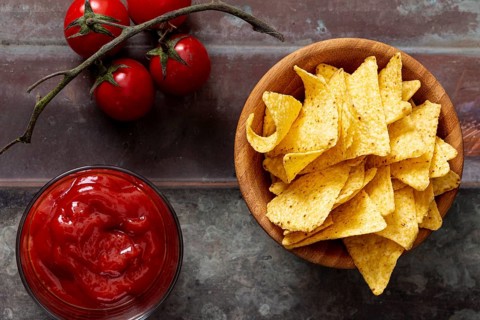 Nachos bowl tomato sauce table