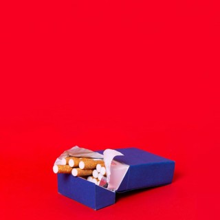 Pack cigarettes with red background