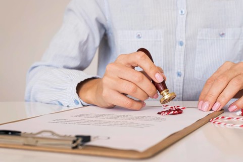 Person using wax seal front view