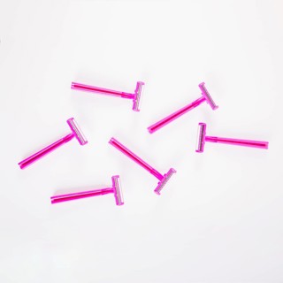 Pink female razors white background
