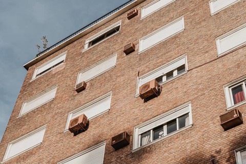 Residential building city with air conditioning units