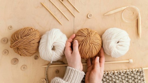 Top view assortment with knitting tools