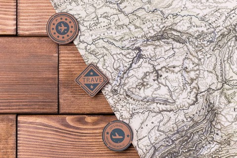 Top view world tourism day logos with world map
