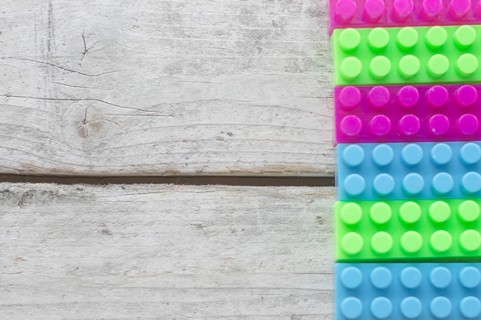 Toy bricks wooden surface