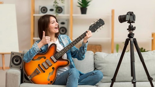 Woman filming music video home