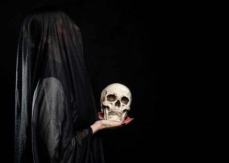 Woman with black veil copy space
