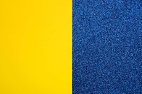 Yellow cardboard paper blue carpet
