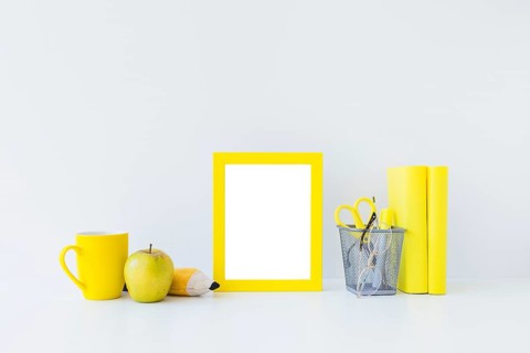 Yellow writing accessories studies white workplace