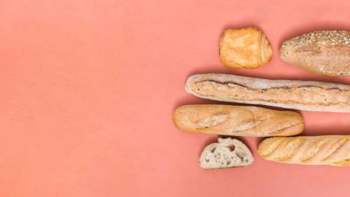 Baguette bread loaf puff pastry buns colored background