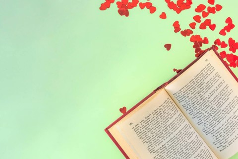 Book near set ornament paper hearts