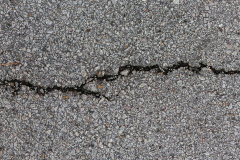 Cement surface with rocks crack