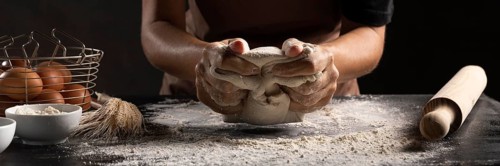 Chef using hands knead dough
