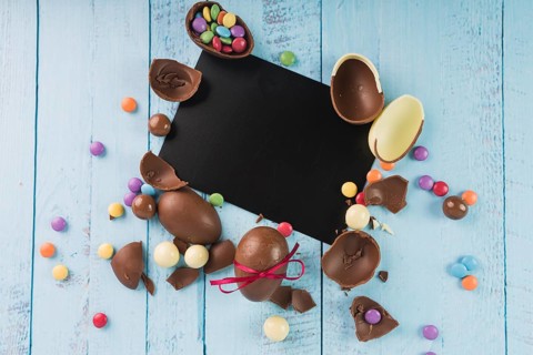 Chocolate eggs with black paper