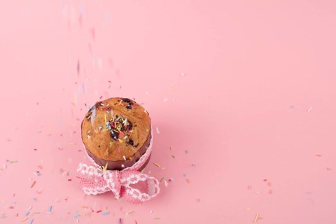 Colorful sprinkles falling easter cake