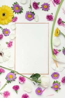 Colourful festive flowers background with vertical frame copy space