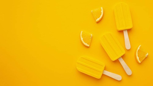 Copy space yellow flavoured ice cream
