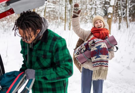 Couple winter time with backpacks