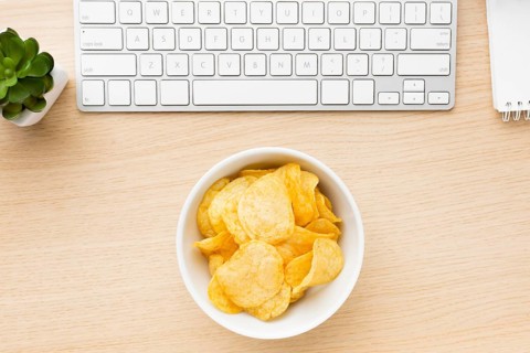 Desk with potato chips bowl