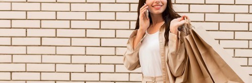 Elegant dressed woman talking phone