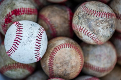 Flat lay dirty baseballs