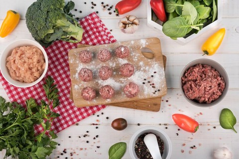 Flat lay meatballs wooden board minced meat broccoli