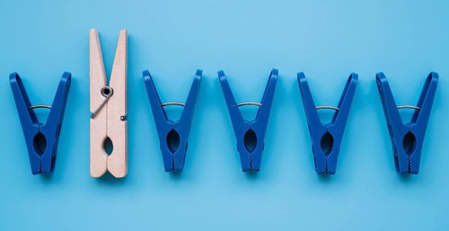 Flat lay plastic clothespins wooden one