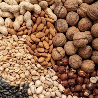 Flat lay variety nuts including almonds