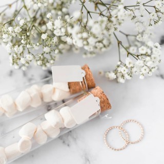 Golden wedding rings baby s breath flowers marshmallow test tubes with white tag