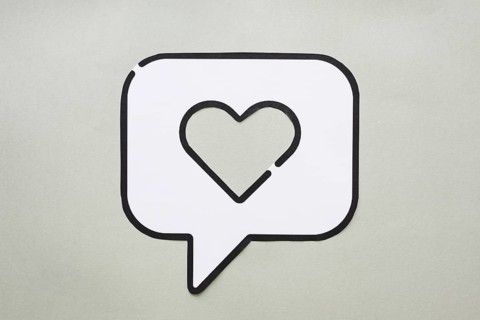Heart bubble speech icon table