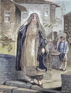 An Egyptian woman wearing a dress to go out and a niqab