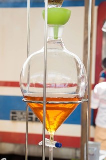 Herbal tea distilling mechanism with flasks in the view