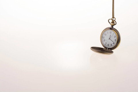 Isolated retro styled pocket watch on white background