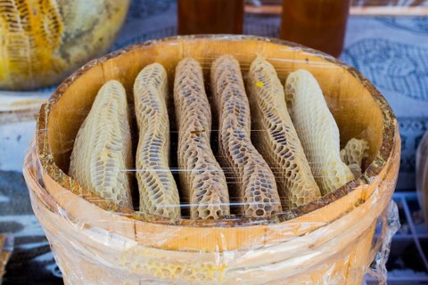 Sweet fresh honey in the sealed comb frame