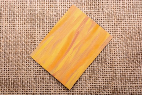 Piece of painted note paper on a linen canvas