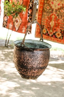 Selling old metal cookware in bazaar