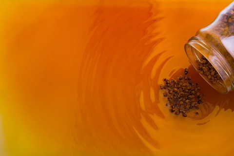 Coffe slowly dissolve in the hot water