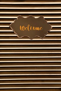 Welcome wording on sign board on background for business concept