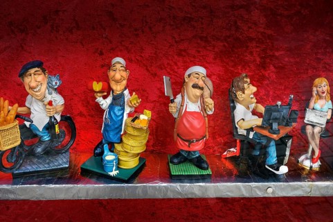 Funny ceramic figurines with different professions